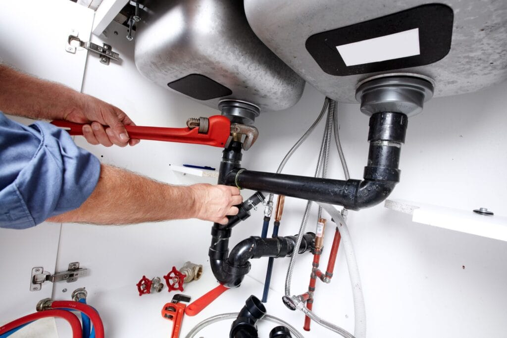 Prescott Valley Plumbing Pros fixing under sink plumbing and drain pipes